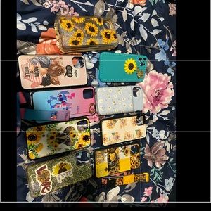 iPhone 11 oro max cases the one with the white flowers is 15$ charging case